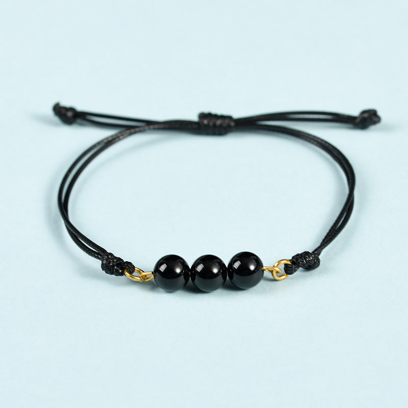 Hot-selling simple black rope Sansheng III bracelet pink crystal tiger eye stone spring design transfer bead bracelet