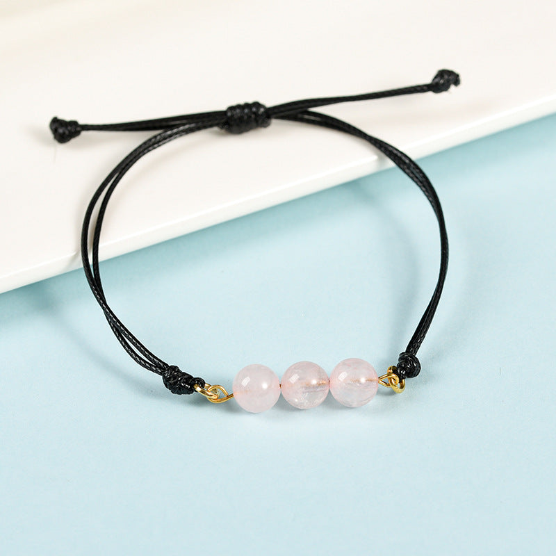 Hot-selling simple black rope Sansheng III bracelet pink crystal tiger eye stone spring design transfer bead bracelet